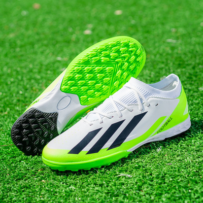 Chaussures de football bas de gamme pour les étudiants avec des épingles longues et courtes design unique chaussures d'entraînement de compétition de gazon artificiel
