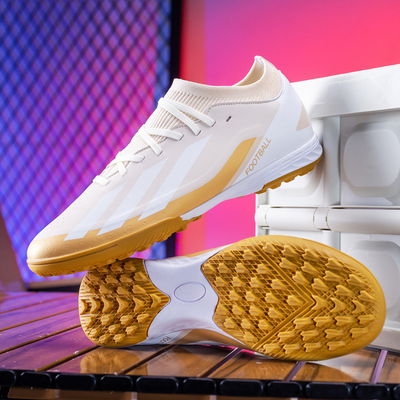 Chaussures de football bas de gamme pour les étudiants avec des épingles longues et courtes design unique chaussures d'entraînement de compétition de gazon artificiel