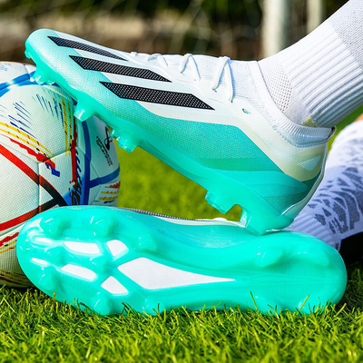 Chaussures de football bas de gamme pour les étudiants avec des épingles longues et courtes design unique chaussures d'entraînement de compétition de gazon artificiel