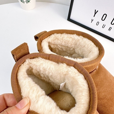 Bottes de neige en cuir de vache en hiver en plus de velours Bottes courtes en cuir authentique étanches à l'eau et antidérapantes chaussures de coton chaudes pour enfants