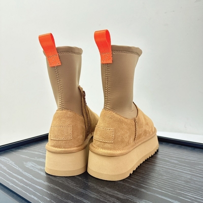 Bottes à crayon à semelle épaisse et mince pour femmes Nouvel hiver en plus de laine Bottes à neige épaissis pour femmes Vêtements extérieurs en cuir de vache imperméable