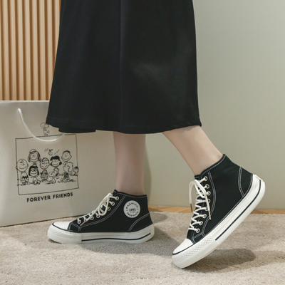 Vente en gros de chaussures en toile d'oreilles ovales de haute qualité pour femmes