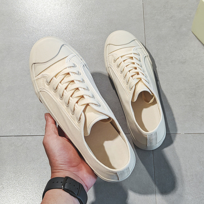 Été 2024 Nouvelles chaussures en toile blanche et lactée respirantes chaussures d'hommes chaussures blanches toutes matches chaussures décontractées à la mode chaussures d'hommes